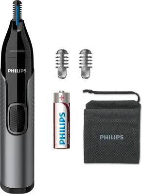 A Philips nose and eyebrow trimmer kit is displayed against a white background, along with its accessories.