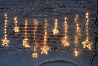 Produktbild von LED-Vorhang Monde Sterne Lichterkette 132 LED warmweiß Fensterdekoration außen innen
