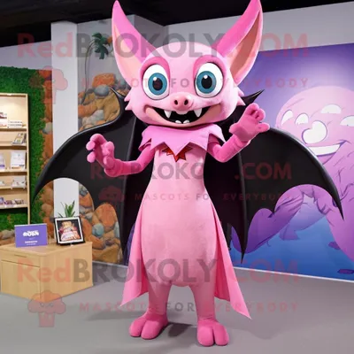 Produktbild von Rosafarbene REDBROKOLY Fledermaus Maskottchen kostümfigur bekleidet mit einem Etuikleid und Fußkettchen
