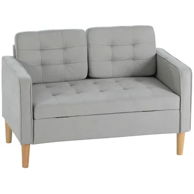 A light gray loveseat sofa with tufted cushions and wooden legs is shown against a white background.