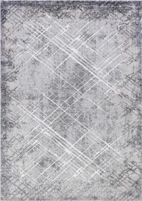 A top-down view of a rug with an abstract pattern.