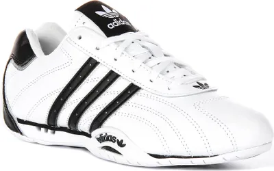 A white Adidas sneaker with black accents.