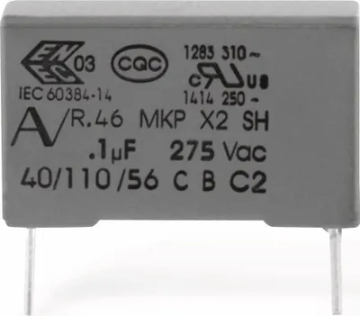 A close-up view of a gray electronic component with black text and logos printed on it.