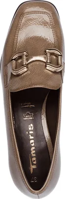 A top-down view of a single beige loafer shoe.