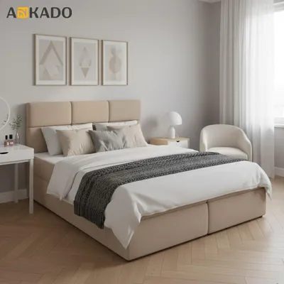 A bedroom scene with a bed, nightstand, and chair.