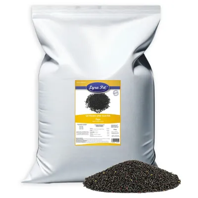 A large bag of birdseed with a pile of seeds in front of it.