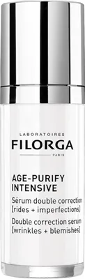 A studio shot of a cosmetic serum bottle.