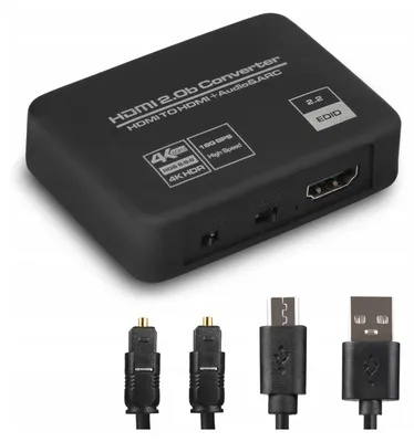 A black HDMI converter with cables shown below.