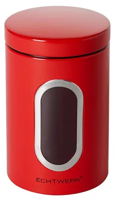 A red metal storage canister with a silver-rimmed window and a black insert.