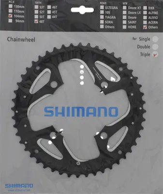 A product image showing a bicycle chainring in its packaging.