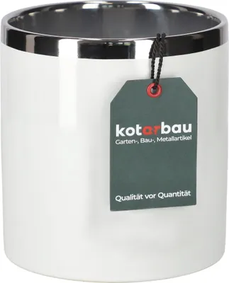 A white ceramic cylinder pot with a silver rim, featuring a dark green tag with brand and product information.
