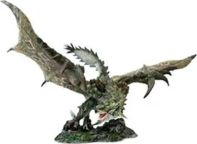 A statue of a green dragon-like creature with wings spread.