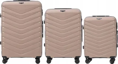 Three suitcases of varying sizes are displayed side-by-side against a white background.