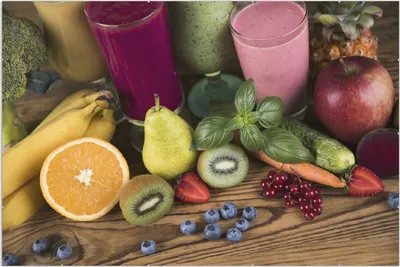 Produktbild von Wallario Wandbild Bunte Smoothies mit Obst in der Küche, Größe: 61 x 91,5 cm, Poster mit rahmenlosen Bildhalter