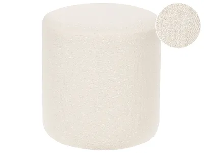 A white bouclé pouf on a white background.