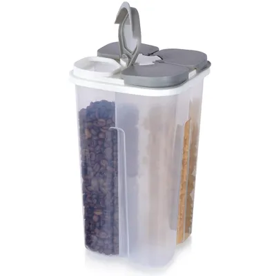 A clear, professional studio shot of a multi-compartment food storage container filled with coffee beans and other dry goods.
