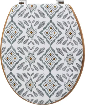 A toilet seat with a patterned design.
