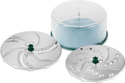 A set of food processor blades and a storage container.