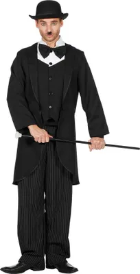 A man dressed in a Charlie Chaplin costume, holding a cane.