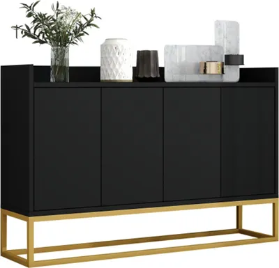 A black sideboard with a gold base, decorated with various items on top.