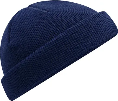 A close-up studio shot of a dark blue beanie.
