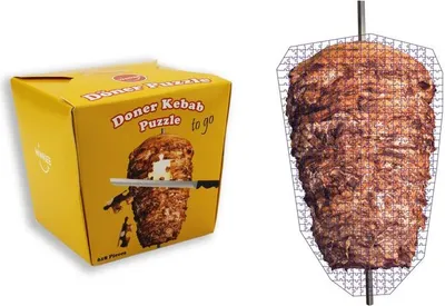 A yellow box with a picture of a döner kebab puzzle on it, next to a picture of a döner kebab puzzle on a spit.