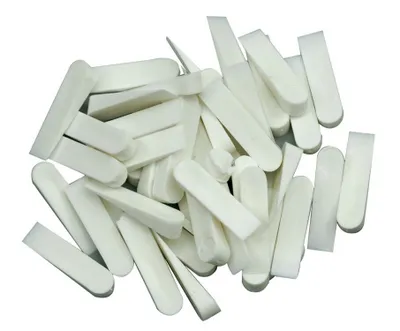 A pile of white plastic wedges.