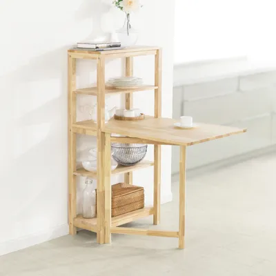 A wooden folding table with shelves in a bright room.