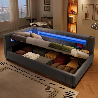 A bed with storage is shown in a bedroom setting with blue LED lighting.
