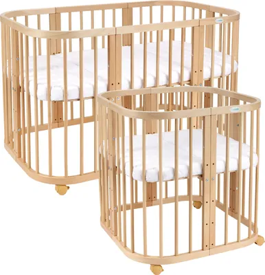 Two wooden cribs of different sizes are shown against a white background.