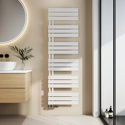 A modern bathroom setting with a white towel radiator, a wooden vanity, and a round mirror.