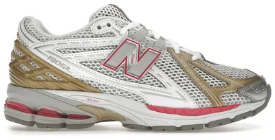Immagine prodotto di New Balance 1906R, colorazione Silver Dragon Berry Gold, taglia EU 42.5