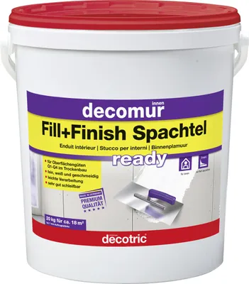 A white bucket of spackle with a red lid and a colorful label.