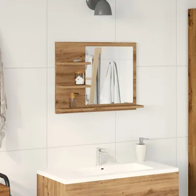 A bathroom vanity with a mirror and shelves above it.