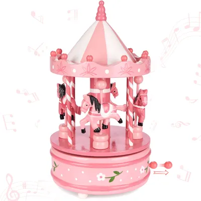 A pink wooden carousel music box with horses.
