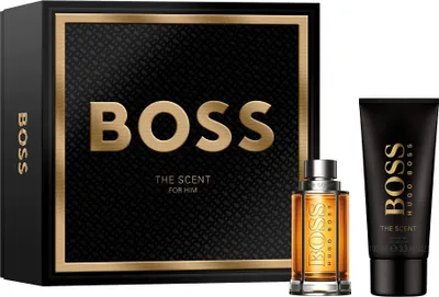 A Hugo Boss fragrance gift set for men, including a perfume bottle and a shower gel tube, presented in its branded packaging.