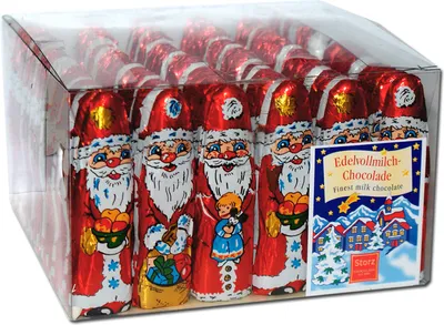 A clear plastic box filled with individually wrapped chocolate Santas.
