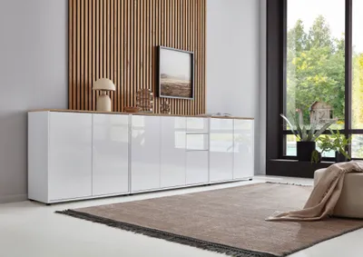 Immagine prodotto di Credenza BMG «Mailand Set 6», corpo bianco opaco e frontali laccati bianco lucido, ripiano superiore in rovere Artisan