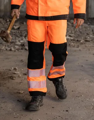 Immagine prodotto di Korntex EOSTR | EOS Pantaloni da lavoro Hi-Vis con aree di stampa - Farbe: Arancione/Nero - Größe: 52