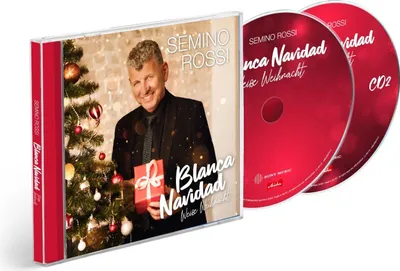 A CD case and two CDs for the album 'Blanca Navidad - Weiße Weihnacht' by Semino Rossi, featuring the artist holding a gift next to a Christmas tree.