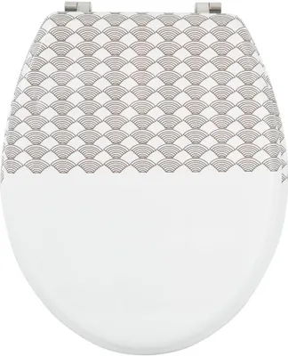 A top-down view of a toilet seat with a decorative pattern.