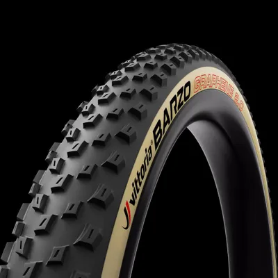 A close-up studio shot of a bicycle tire against a black background.