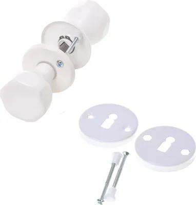 A white door knob set with two rosettes and screws on a white background.