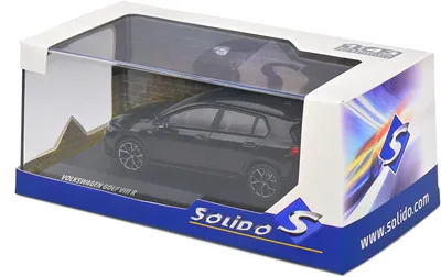 A model car of a Volkswagen Golf VIII R in its packaging.