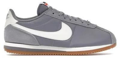 Zdjęcie produktu dla Nike Cortez Textile w kolorze szarości cementowej, beżu, pomarańczu i bieli (damskie) - rozmiar EU 36