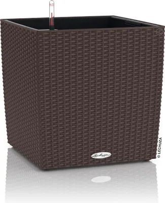 A brown woven planter with a water level indicator inside.