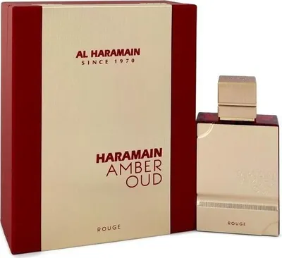 A product shot of Al Haramain Amber Oud Rouge Eau de Parfum and its packaging.