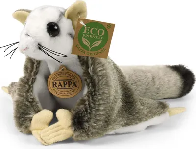 A plush toy squirrel with tags attached, lying on a white background.