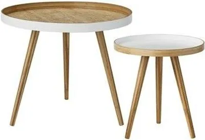 Two round side tables with white tops and wooden legs.