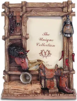 A western-themed picture frame decorated with horse, saddle, boots, lantern, and chili peppers.